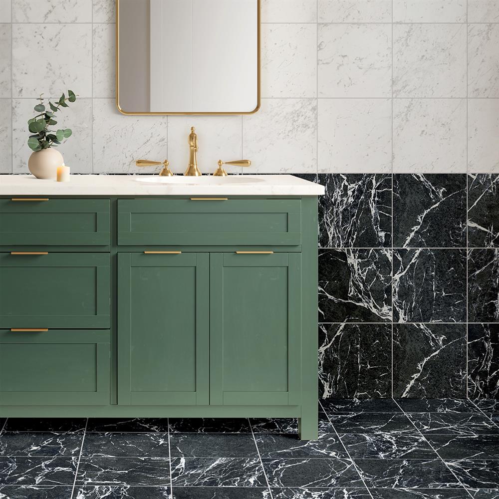 White carrara and green marble-effect tiles on a bathroom wall and floor